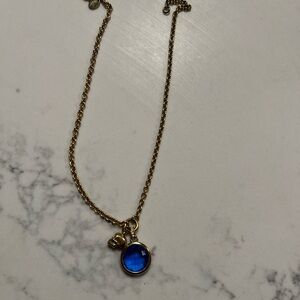 Juicy couture gold & blue skull necklace